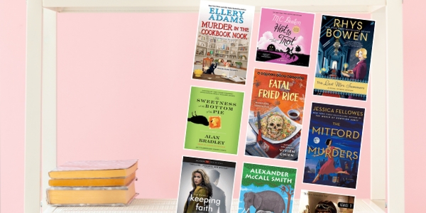 pink wall and a white bookshelf with various book covers