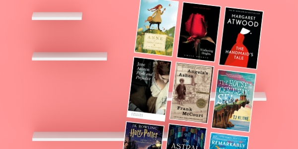 white bookshelf with various book covers against a pink wall