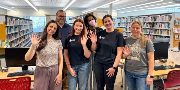 waving library staff