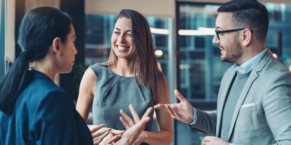 three adults talking