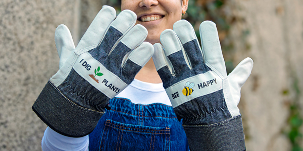 adult wearing machine embroidered gardening gloves