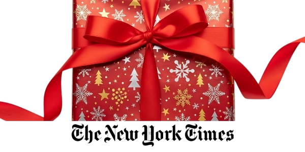 gift wrapped in festive red paper and a red satin bow with The New York Times logo beneath