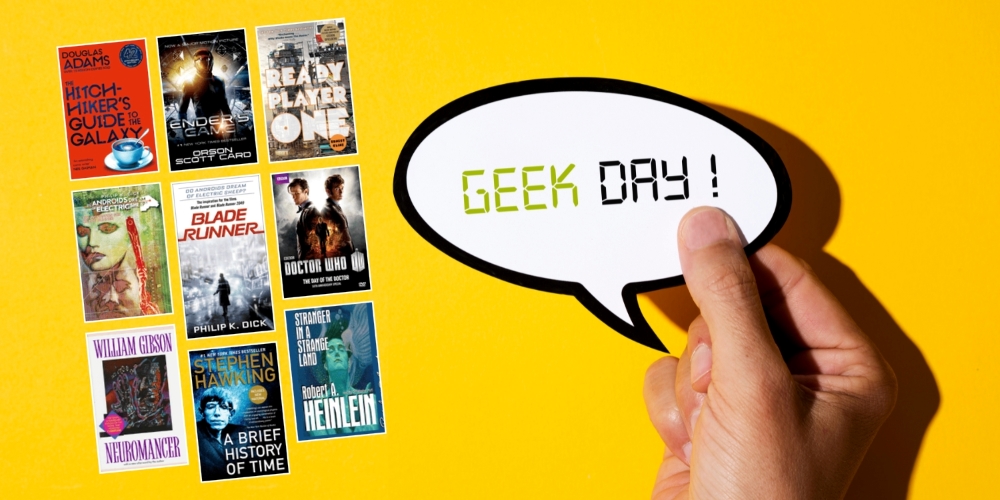 various book covers beside a handing holding a speech bubble saying Geek Pride!