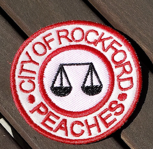 embroidered patch of rockford peaches team from a league of their own