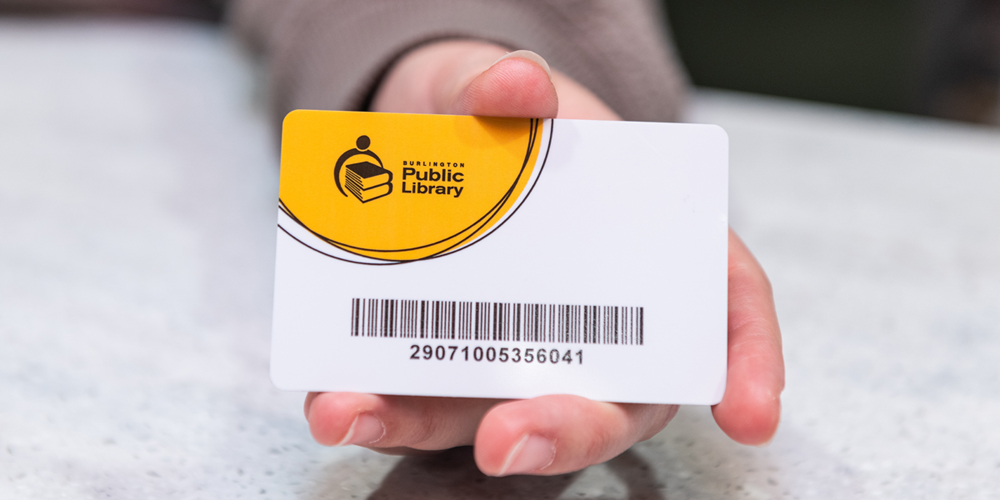 handing holding a BPL card