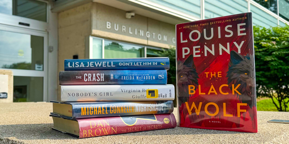 six books displayed outside in front of Central Branch