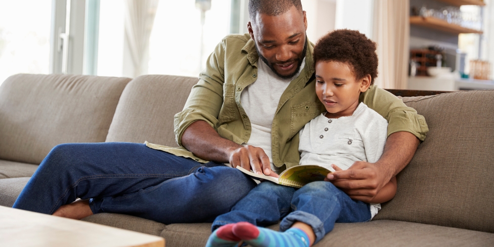 adult reading to a child