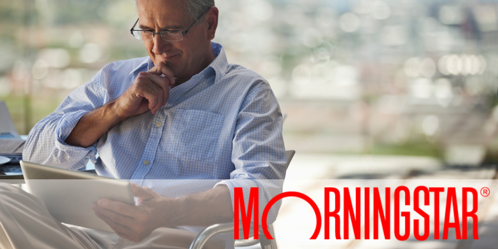 older adult looking at a tablet with Morningstar logo in the foreground