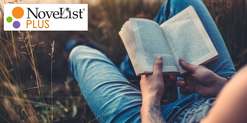 adult sitting in a field reading a paperback novel and Novelist Plus logo