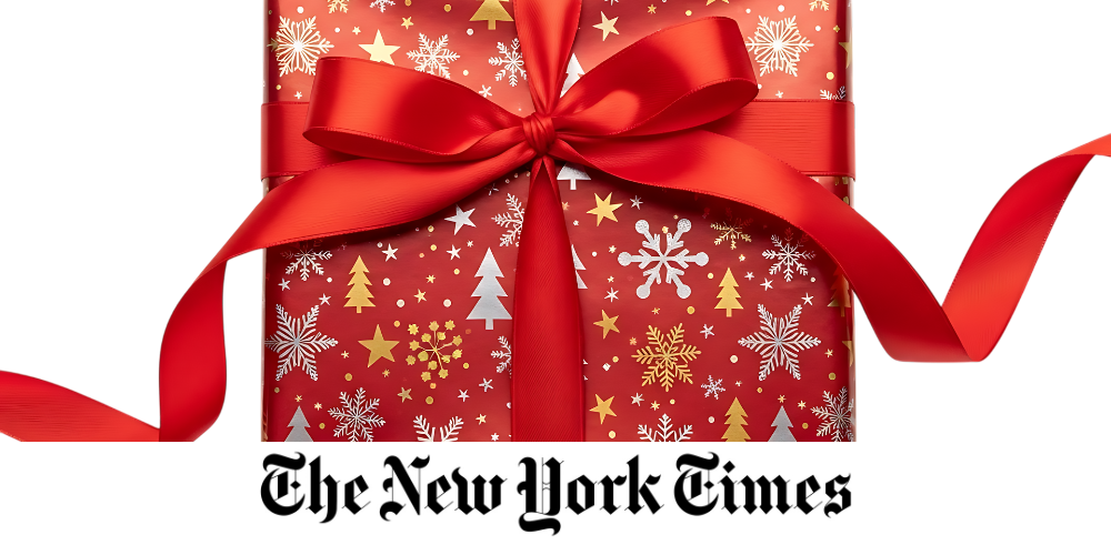 gift wrapped in festive red paper and a red satin bow with The New York Times logo beneath
