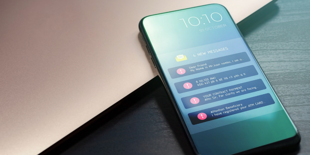 smartphone displaying four new messages from scanners